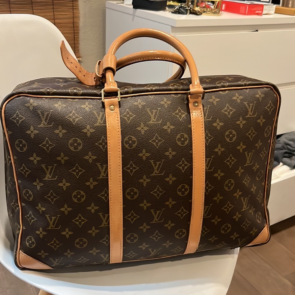 Louis Vuitton AUTHENTIC Sirius travel Bag